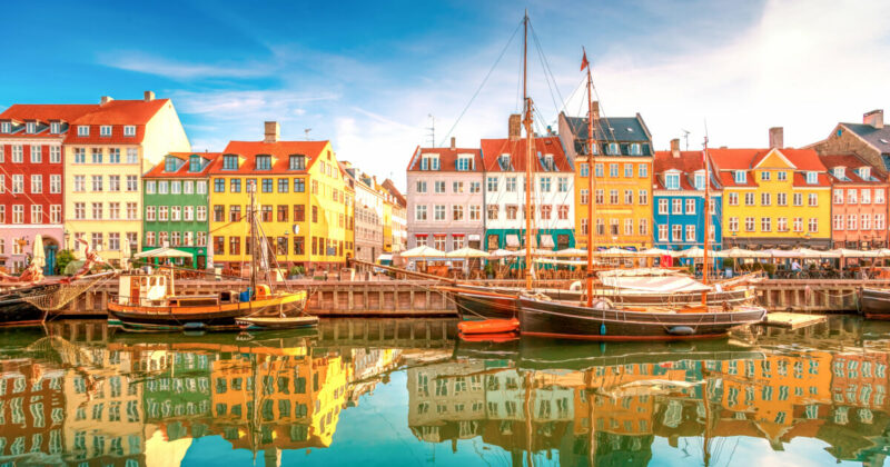 See amazing sights like this colorful Copenhagen neighborhood with Phoenix to Copenhagen flight deals