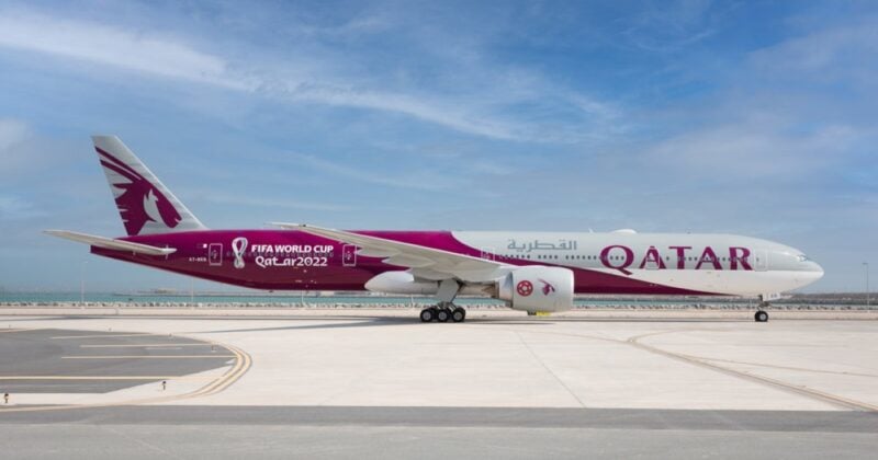 Qatar Airways jet on tarmac with FIFA WC '22 livery