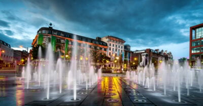 Fountains at Piccadilly Gardens at dusk, Manchester, England